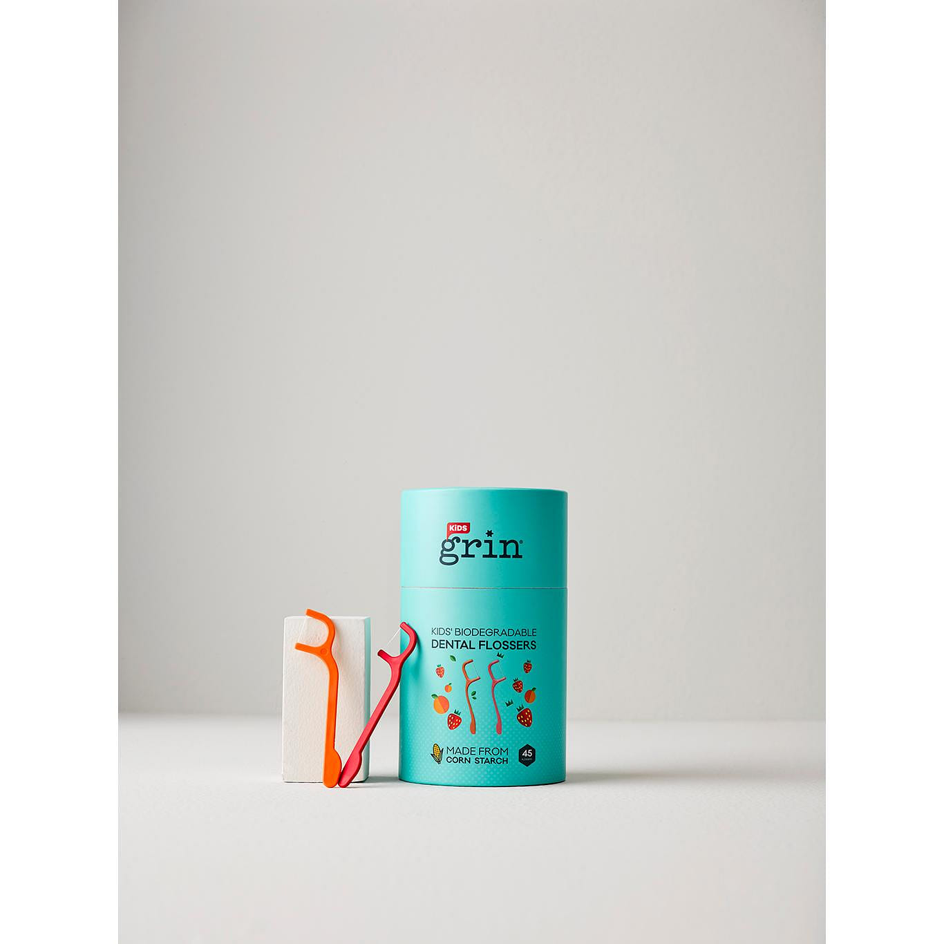 grin kids oral care pack-strawberry paste, orange toothbrush and kid flosser 3 cái